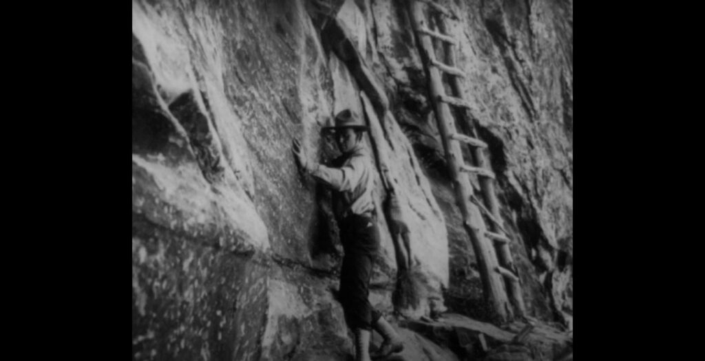 Man near the wall at Grand Canyon